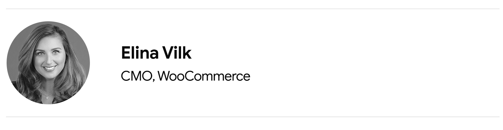 Elina Vilk, CMO, WooCommerce, is pictured from the shoulders up. She has light skin and long light-brown hair. She wears a dark collared top and a necklace.