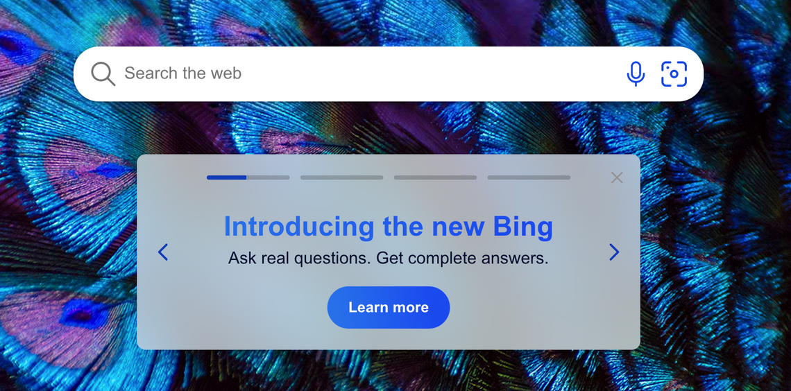An image of the Bing homepage with a search bar and text that reads "Introducing the new bing, ask real questions, get complete answers" and a button below that says "learn more"